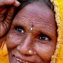 woman in yellow sari - India